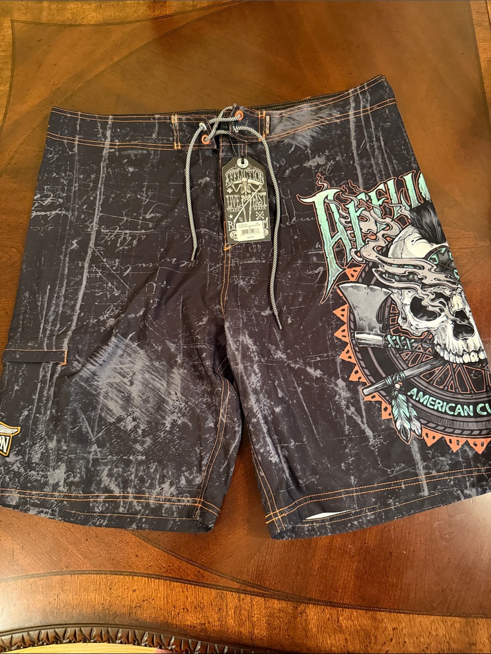 Affliction Black Swim Board Shorts with Teal Skull Graphic